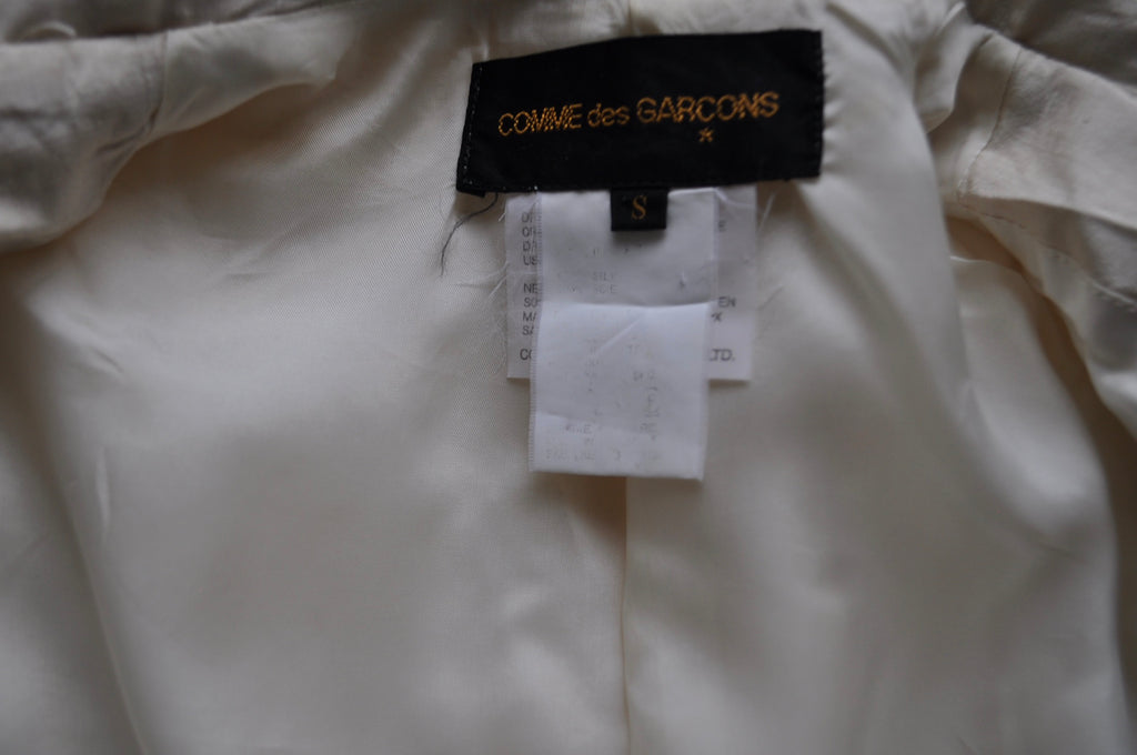 Rare Comme des Garçons silk coat from 1991