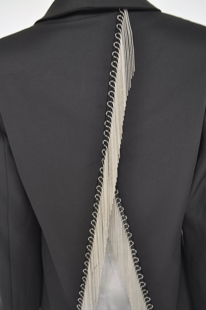 Avantgarde jacket with metal strings attached