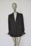 Avantgarde jacket with metal strings attached