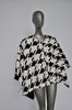 Fabulous fur cape with houndstooth print.