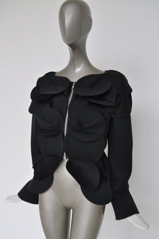 Slashed Bohemian style knit vest by Rodarte