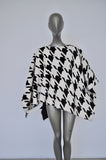Fabulous fur cape with houndstooth print.