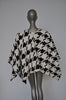 Fabulous fur cape with houndstooth print.