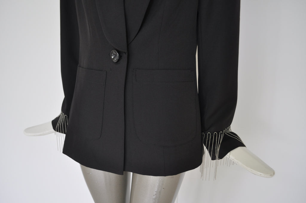 Avantgarde jacket with metal strings attached