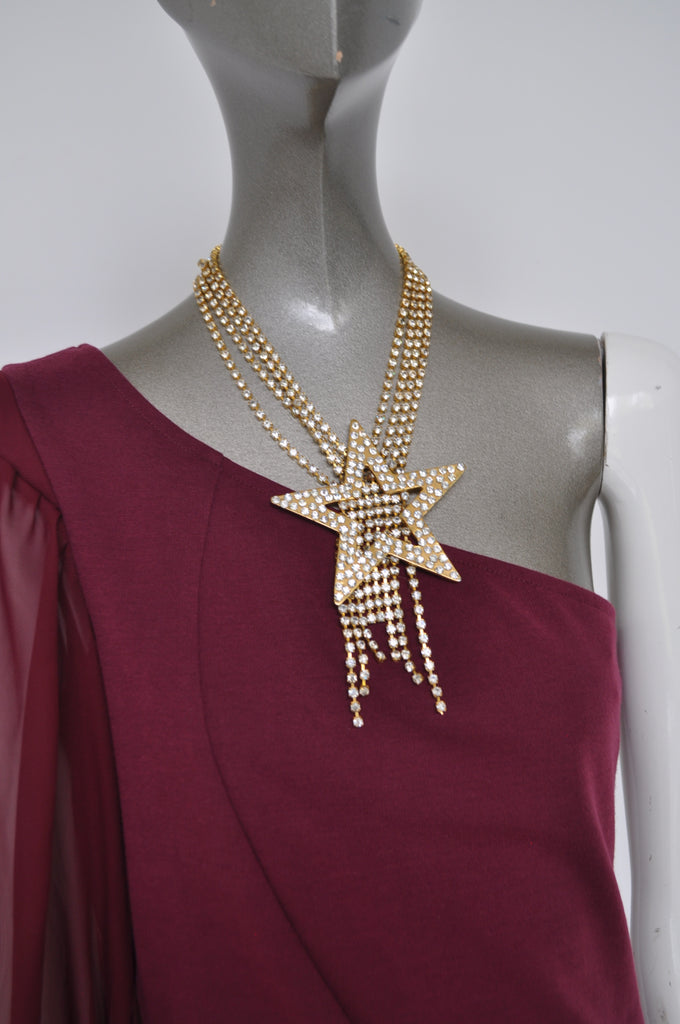 Rare Moschino necklace from the 80s. Huge star with christals