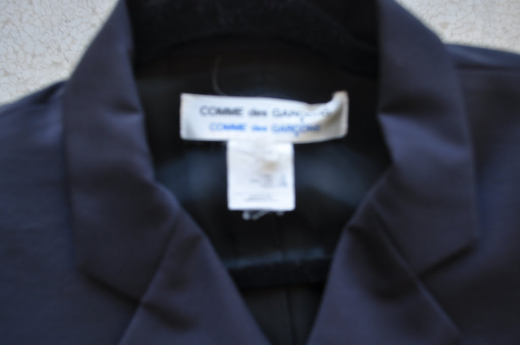 Comme des Garçons apron dress and jacket from 89