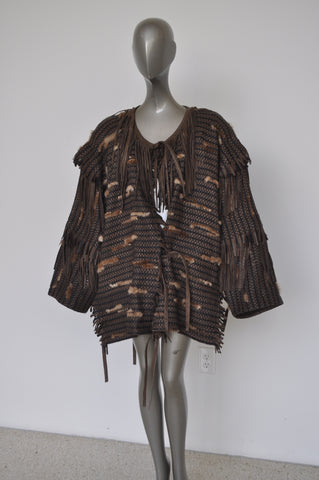 Paco Rabanne tooled leather vest. Hers 1970s