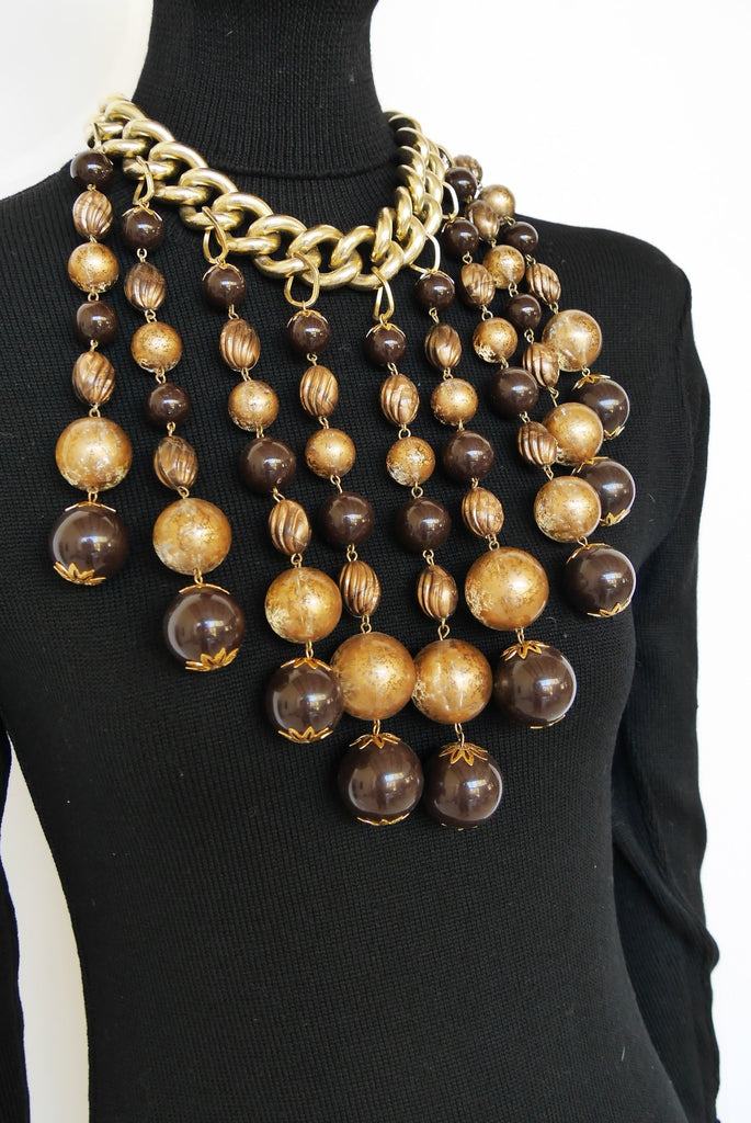 Massive 80s necklace with glass pendant balls.
